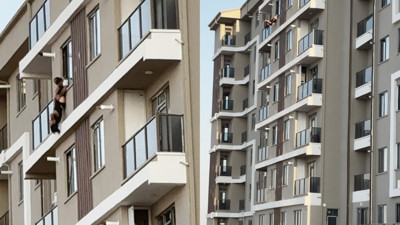 Aksaray'da 7. katta intihar girişimi! Genç kadın ayaklarından tutularak kurtarıldı